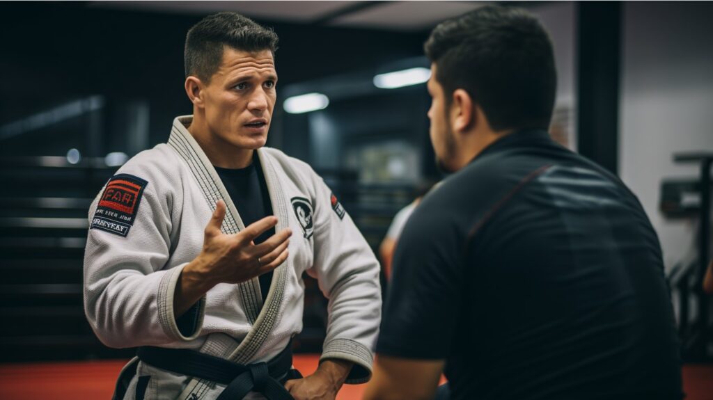 A black belt in jiu jitsu giving advice to a student